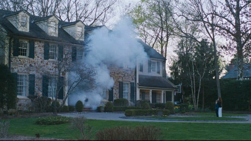 Why do they burn the Therapist's house down in Mr. and Mrs. Smith? 1